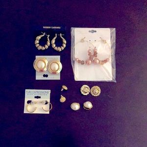 New, fashion, gold-tone earrings, pierced and clip on. All new! Seven sets.